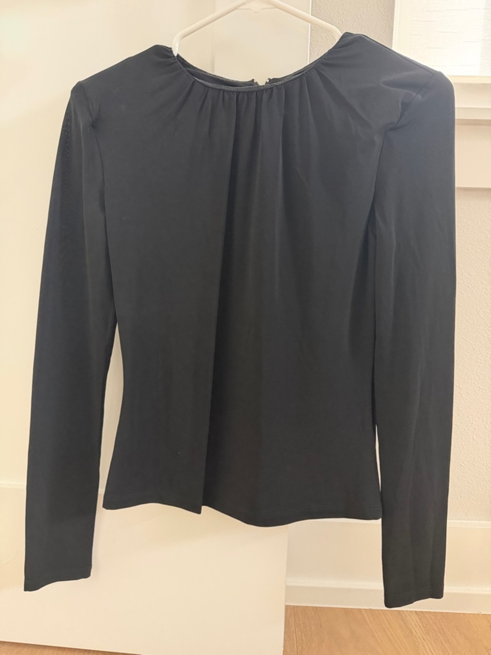 Aritzia Fitted Black Long-Sleeve Blouse with Shoulder Pads